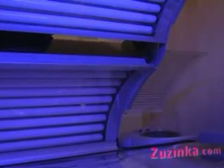 Hidden camera catches brunette at the solarium